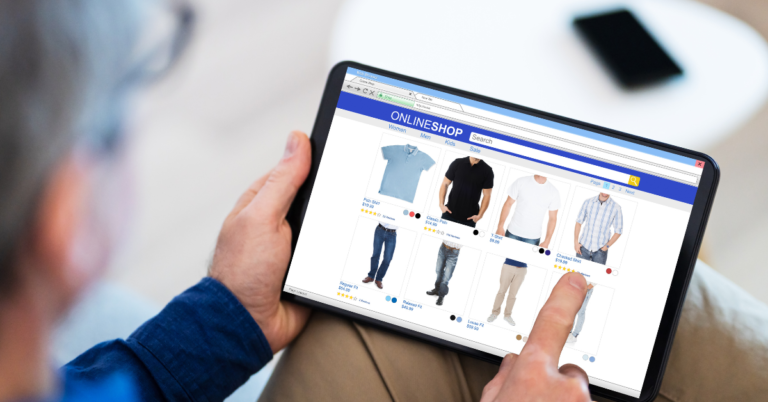A man scrolls products on an online store. Learn how to create mockups for your online store with our free apparel mockup generator at Mockify.